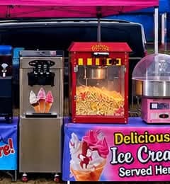 A soft-serve ice cream machine and popcorn machine at the Angry Donut setup